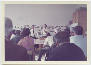 Gruppo di uomini nel corso di una riunione