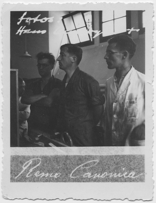 Remo Canonica con due operai in un officina