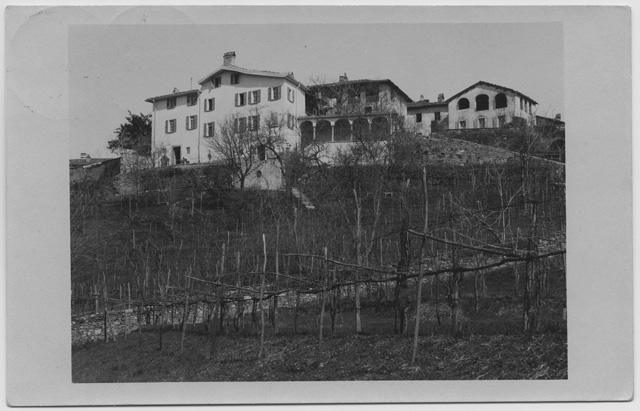 Cartolina di Comano con Casa San Carlo