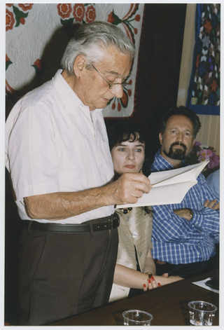 Ugo Canonica legge una sua poesia in occasione della presentazione de "I predé e nosance" a Bidogno